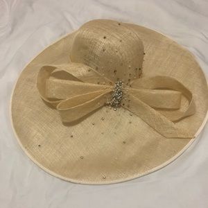 Hats in the Belfry straw wide brim beaded hat.